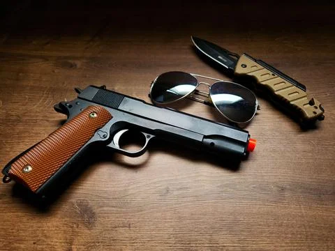 Weapons and Sunglasses Stock Photos