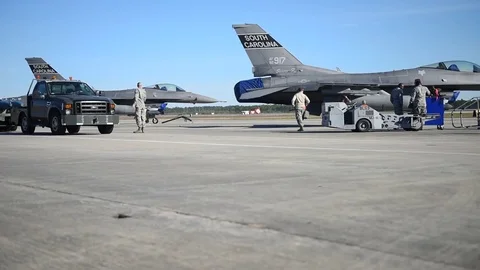 Weapons arriving for building and loading program with F-16 Stock Footage 83306664