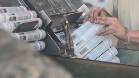 Weapons load crew load ammunition into weapons loader for A-10 Thunderbolt II Vídeos de archivo 105715842