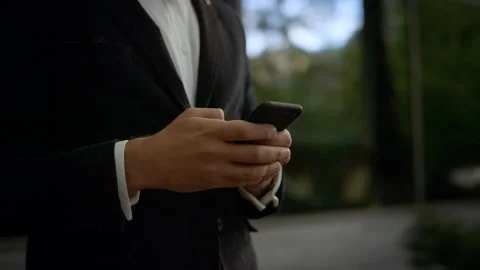 Wearing Classical Suit. Social Network. Apps. Smartphones. Close-up of male Video stock 131599087