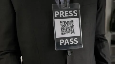 Wearing a Press Pass Indentification Badge Card with QR Code Stock Footage 140472389