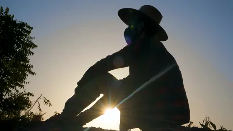 Wearing a protective face mask against the sun, due to the COVID-19 pandemic. Stock Footage 234486883