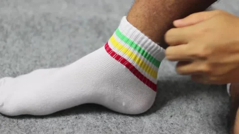 Wearing socks Stock Footage 326712351