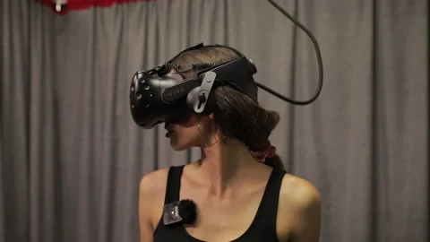 Wearing virtual reality headset. Augmented Reality. Man touch something using Video stock 142901632