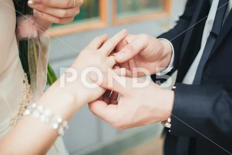 Wearing wedding ring ceremony tradition Stock Photos