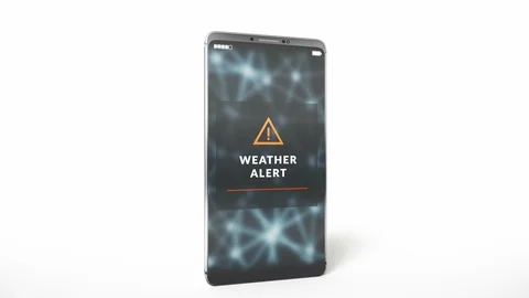 Weather alert notification on a smartphone display screen. 動画素材 115840355