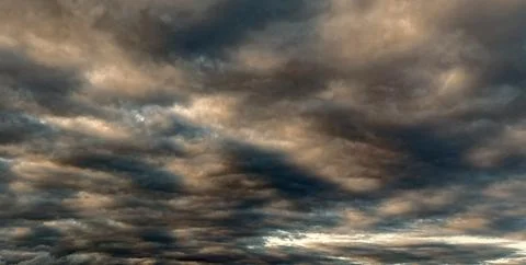 Weather cloudscape. Sky filled with cloud. Overcast scene. Cloudy sky view Fotos Stock