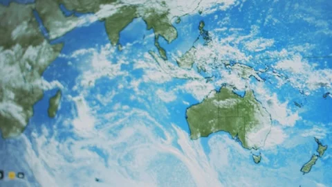 Weather forecast on world map on computer screen. Web service showing cloudy Stock Footage 272790758
