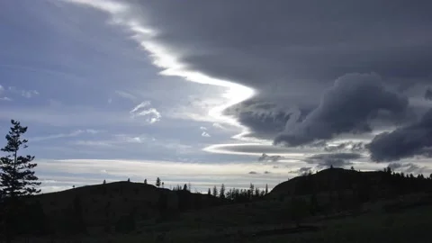 Weather front, streaming clouds over hills, timelapse, dramatic, Stock Footage 152097736