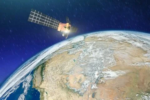 Weather satellite over the desert drought in Earth orbit. Elements of this im Fotos Stock