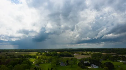Weather - Storm Clouds Passing Above Rural Area 3 - 4K Aerial Hyperlapse 스톡 동영상 110753450