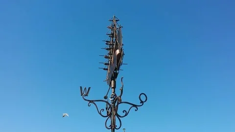 Weather Vane at blue clear sky. Stock Footage 78496787