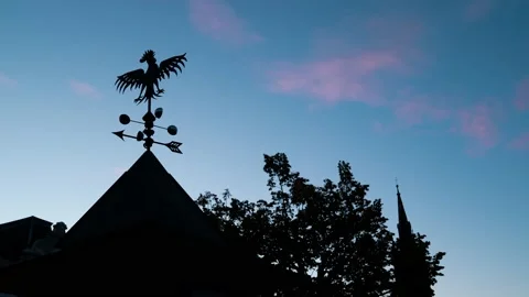 Weather Vane silhouette in sunset Stock Footage 140544904
