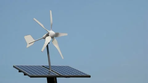 A weather vane with a solar generator is turning in the wind. Stock Footage 145969290