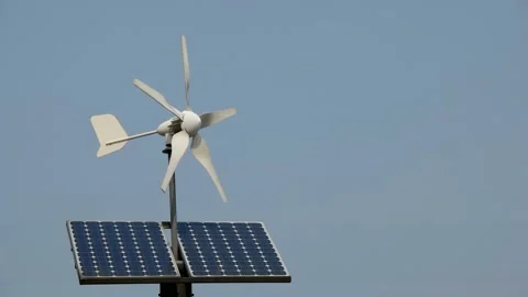 A weather vane with a solar generator is turning in the wind. Stock Footage 145969330
