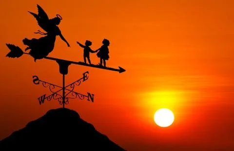 Weather vane at sunset Stock Photos