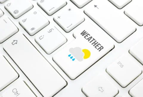 Weather on web concept. sun cloud rain icon on a key on white keyboard Stock Illustration