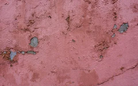 Weathered and crumbling red wall texture Stock Photos