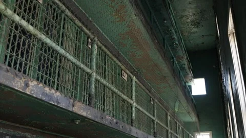 Weathered and Dirty Cell Block in Old Prison - Shallow Depth of Field Stock Footage 246123487