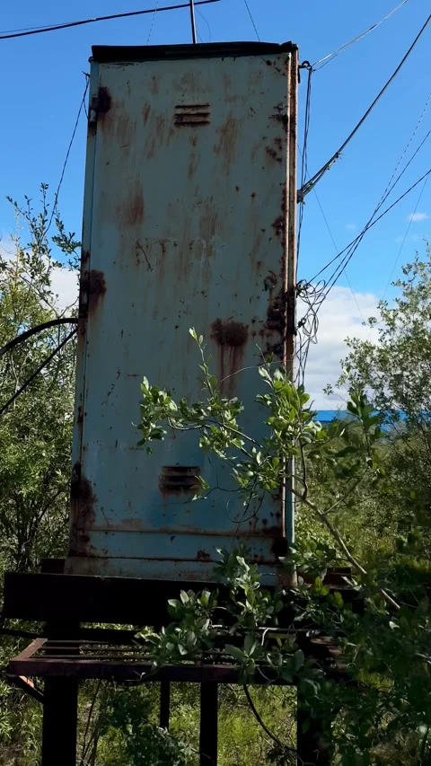 Weathered and Rusty Blue Metal Structure in Nature Stock Footage 341715152