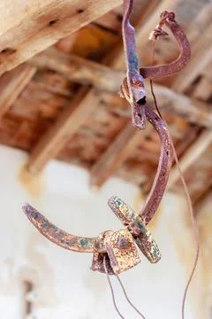 Weathered and rusty hook of a scale in an abandoned mine building, Mazarron Stock Photos