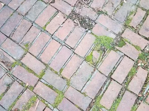 Weathered and worn red bricks or masonry Stock Photos
