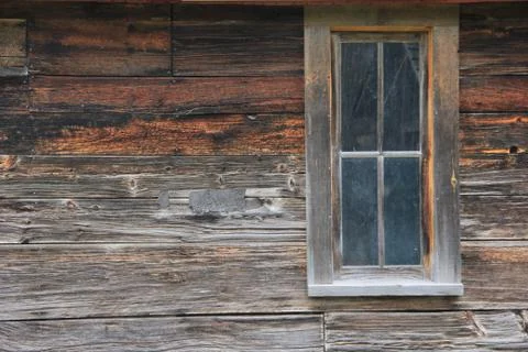 Weathered barn side with window Stock Photos