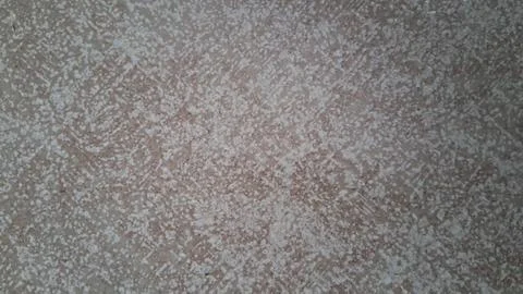 Weathered beige concrete floor surface with detailed dusty speckled texture Stock-Fotos