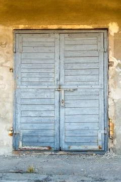 Weathered blue door Stock Photos