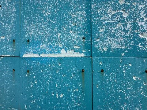 Weathered Blue Metal Panel with Rusty Screws Stock-Fotos