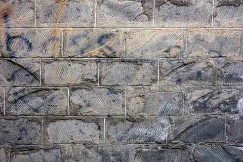 Weathered brick wall with graffiti Stock Photos
