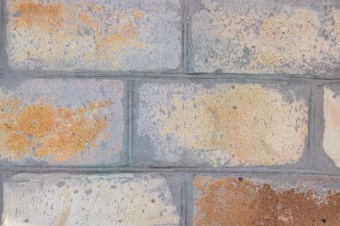 Weathered brick wall pattern background texture close up Stock Photos