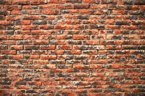 Weathered brick wall Stock Photos