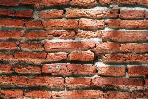 Weathered Brick Wall with Sunlight 스톡 사진