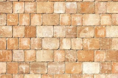 Weathered brick wall texture with rustic stones, featuring natural pattern, e Stock Photos