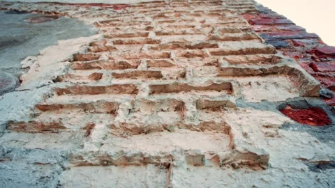Weathered brick wall with textured surface Stock Footage 301124701