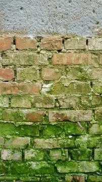 Weathered brickwork wall with rough cement joints Stock-Fotos