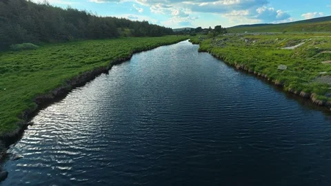 Weathered bridge frames river's calm flow. Rzav River (Zlatibor), Serbia. Vídeo Stock 337122950