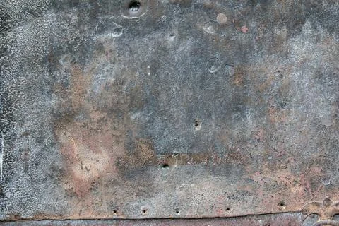Weathered Bronze Surface with Blue Green Patina and Small Holes Stock Photos