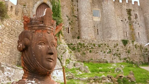 Weathered Clay Sculpture of Queen D. Urraca in Obidos Castle Courtyard Stock Footage 302492443