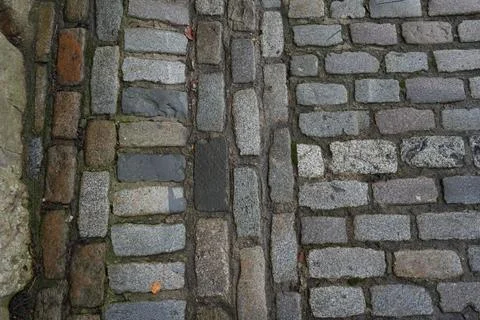 Weathered Cobblestone Pavement Texture In Stanhope, County Durham, England. Stock Photos