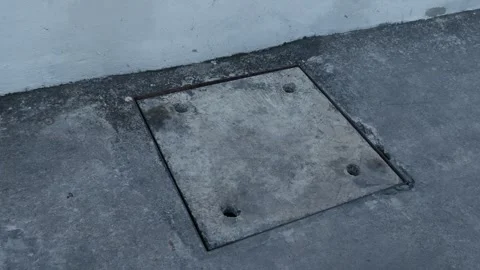 Weathered Concrete Access Panel on Ground Video stock 327831833