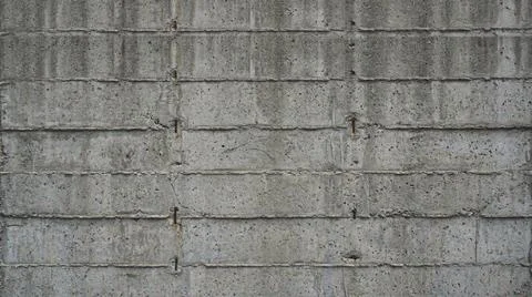 Weathered concrete block wall background texture. Fotos Stock