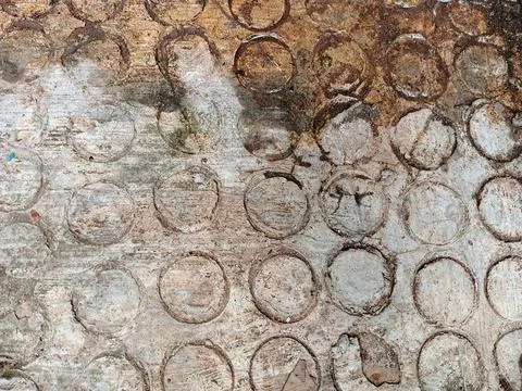 Weathered Concrete Floor with Embossed Circular Pattern 스톡 사진