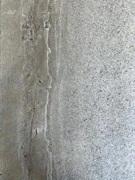 Weathered Concrete Surface with Uneven Construction Joint Stock Photos