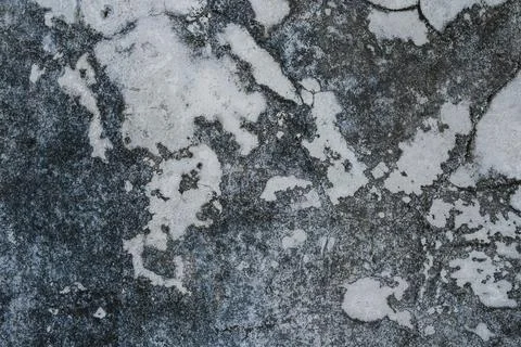 Weathered Concrete Wall Surface with Grunge Texture and Dark Patina Stock Photos