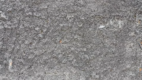 Weathered concrete wall surface showing fine cracks and natural stains, ide.. Stock Photos