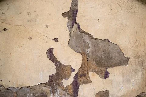Weathered crumbling plaster wall Stock Photos
