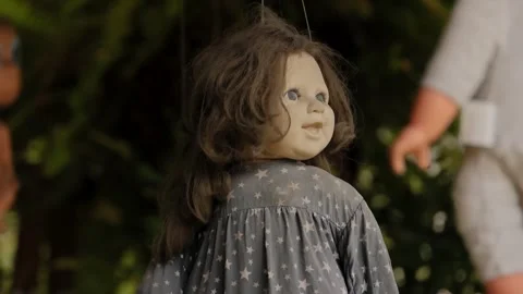 Weathered Doll In Star Pattern Dress Hanging At Island Of Dolls Xochimilco Stock Footage 345099196