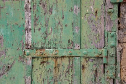 Weathered door and hinge Stock Photos